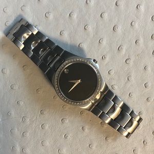 Stainless Steel Movado Watch with Diamond Bezel.